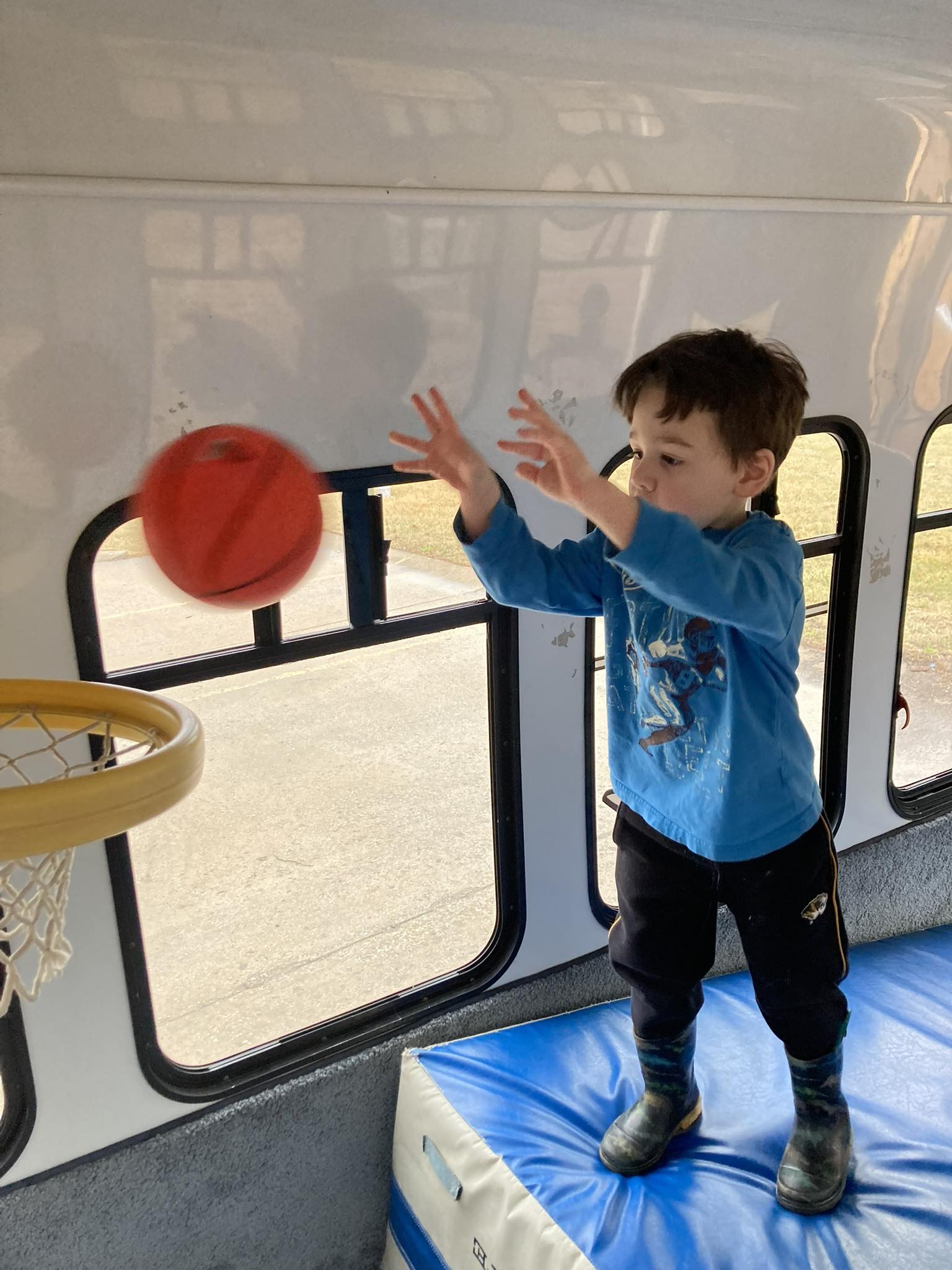 Boy on gym bus - active play time